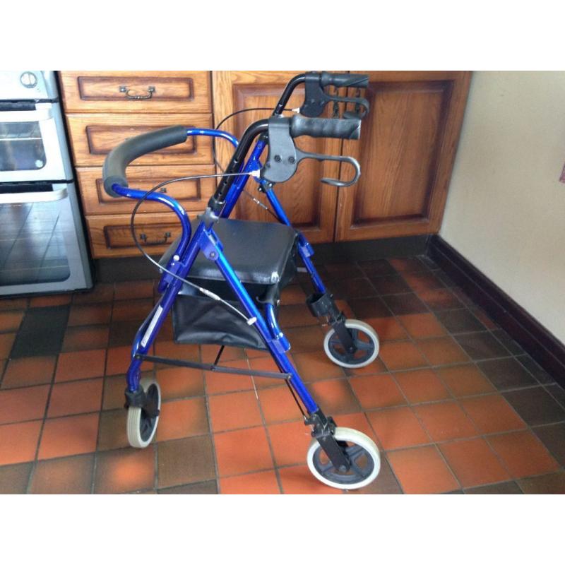 4 wheeled mobility walking aid with seat. Hardly used. Excellent condition