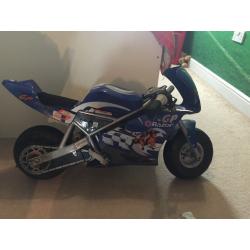 Electric Razor pocket rocket mini moto and oversuit with helmet age 3/4