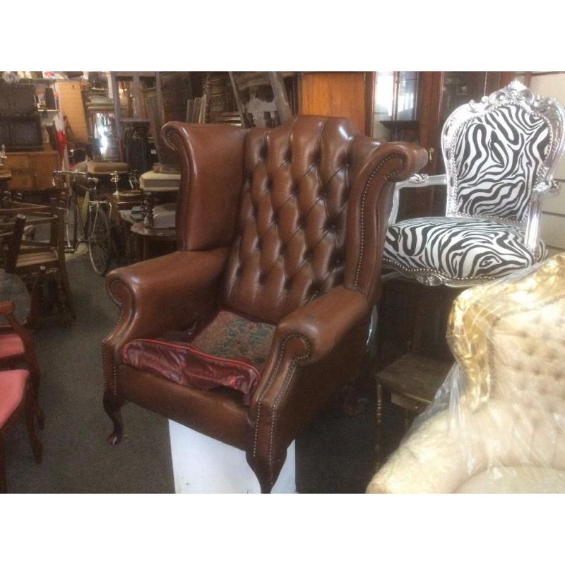 Brown Chesterfield queen Ann chair