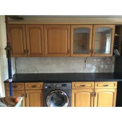 large Kitchen with solid wood doors, cooker, hob and buillt in extractor