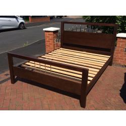 King size wooden bed with mattress in good condition - free delivery available