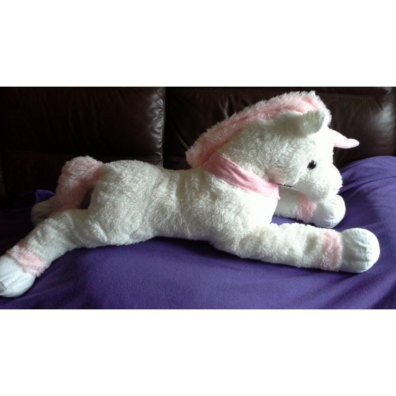 Large white Unicorn with pink ankles, horn, mane and tail. Great soft toy.