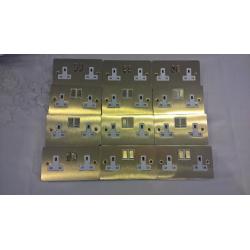 Selection of brass switches and sockets