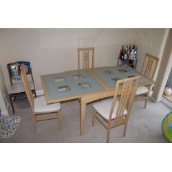 Extendable glass and wooden dining table and 4 chairs