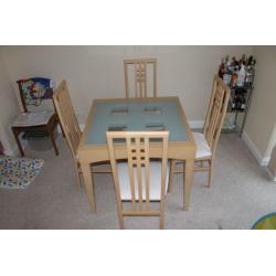 Extendable glass and wooden dining table and 4 chairs