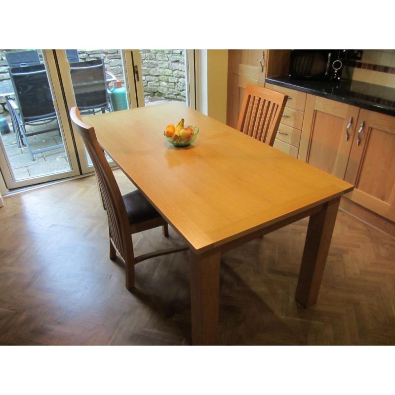 Dining room table and two chairs