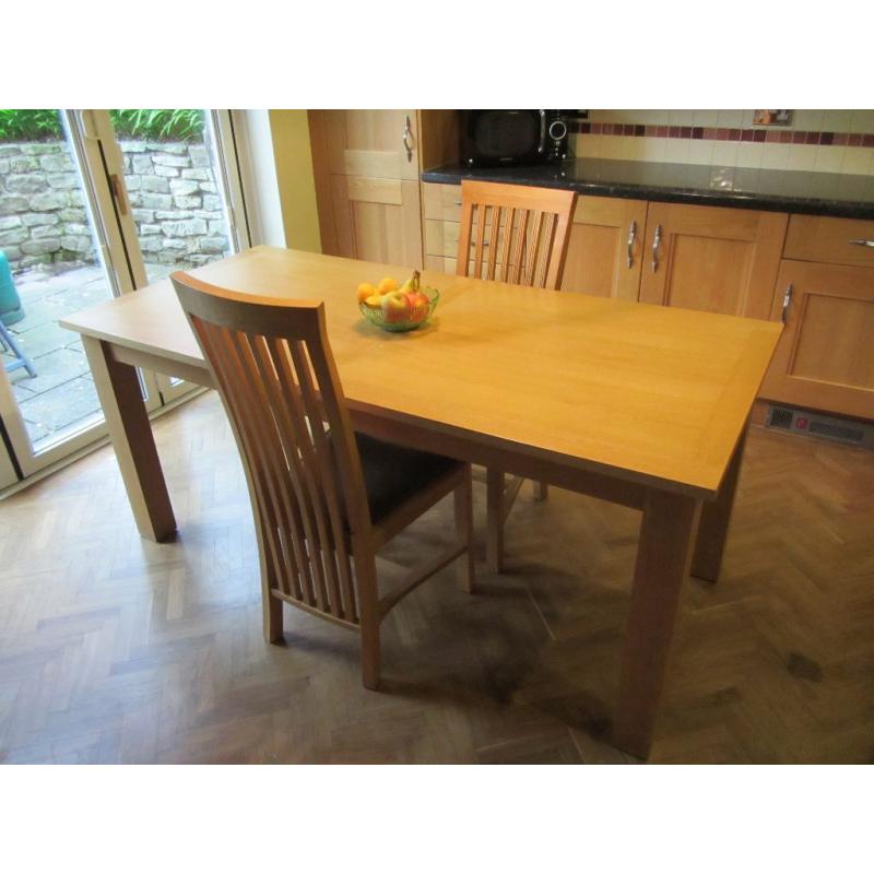 Dining room table and two chairs