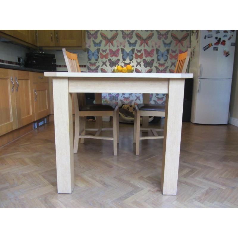 Dining room table and two chairs