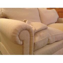 Two seater cream cotton fabric sofa