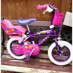 Girl's first bike for sale. 12inch wheels with stabilisers. Great condition.