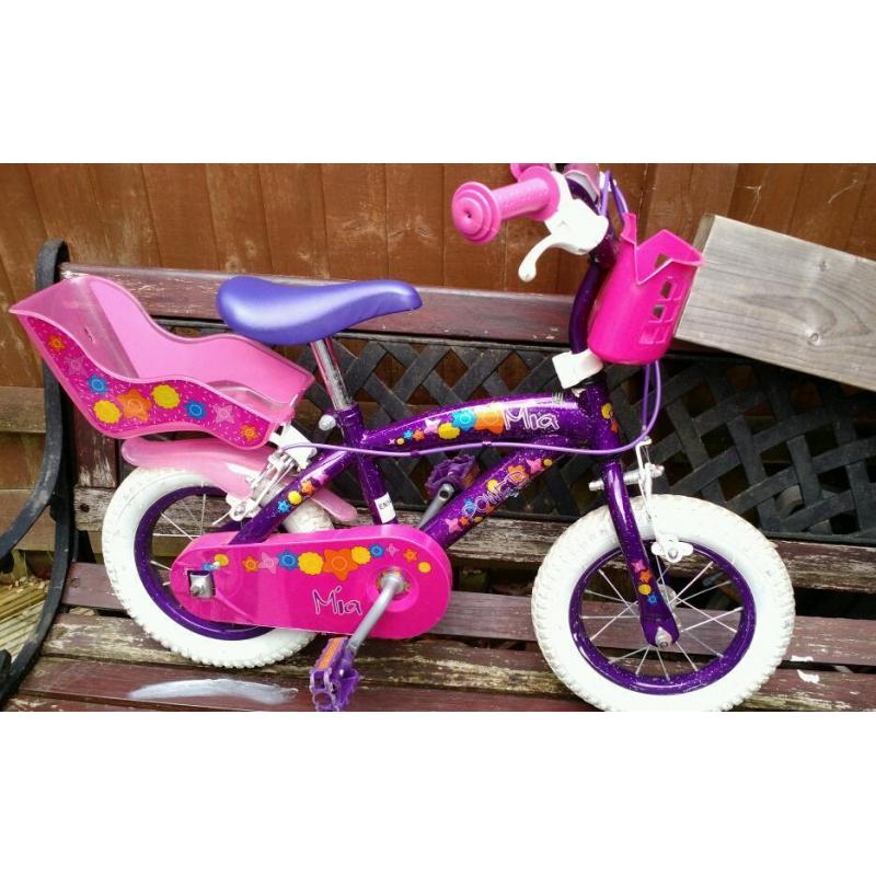 Girl's first bike for sale. 12inch wheels with stabilisers. Great condition.