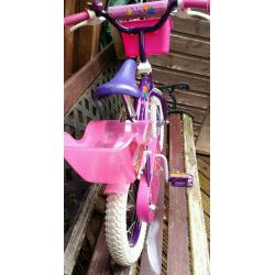 Girl's first bike for sale. 12inch wheels with stabilisers. Great condition.