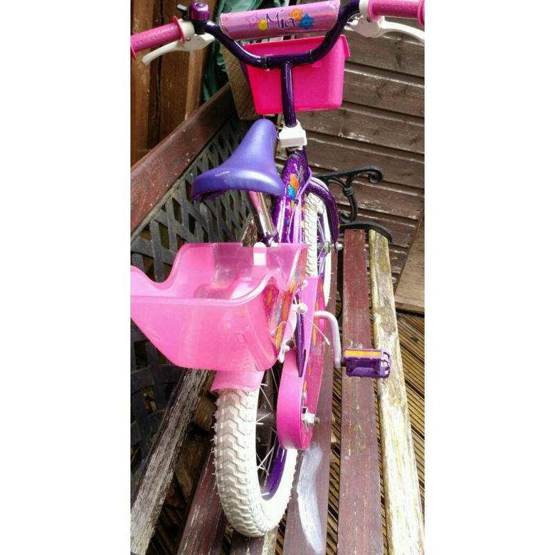 Girl's first bike for sale. 12inch wheels with stabilisers. Great condition.