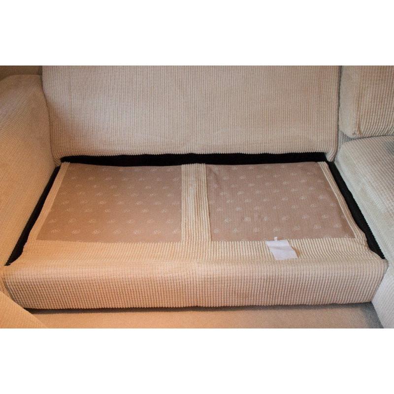 Cream sofa bed with chesis long. Very good condition.