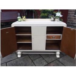 Art Deco dresser with fun swivel drinks cabinet