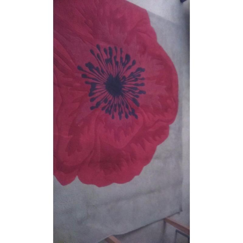 Very well looked after, good quality poppy rug from Next.