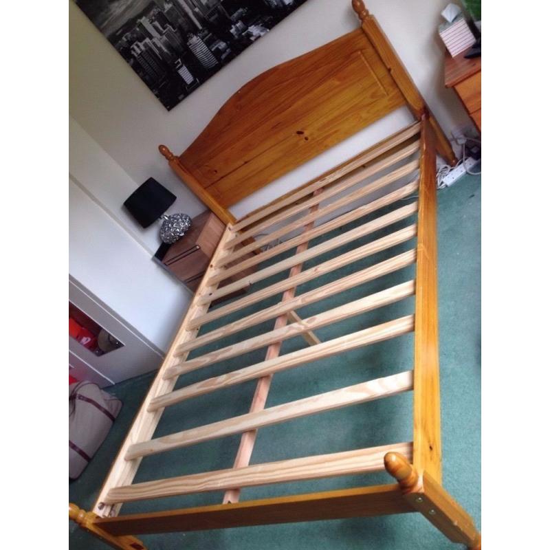 Double bed made of solid wood.