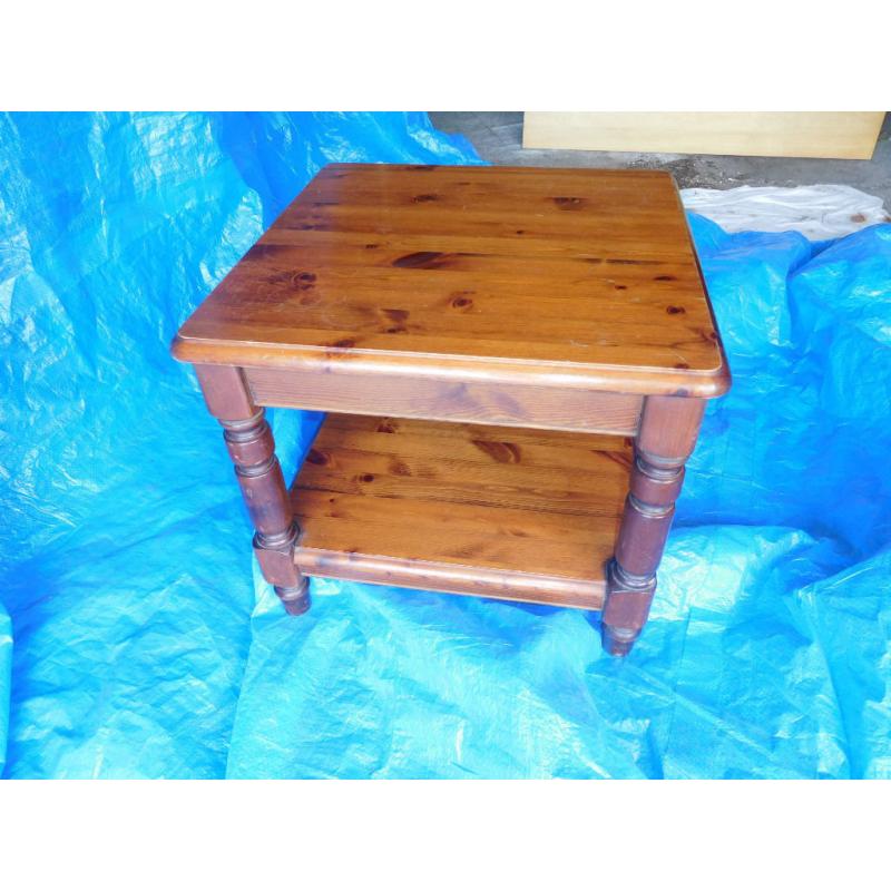 square-shaped dark polished wood coffee table