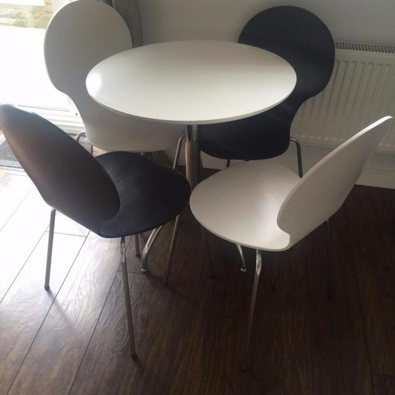 Round white table and 4 chairs from BHS