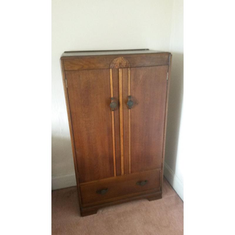 Super-cute small vintage wardrobe.