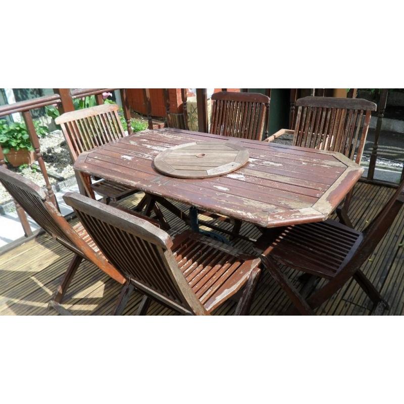 garden table and 6 folding chairs