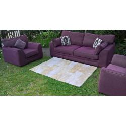 Ex-display Plum Natural Fabric 3 Seater Sofa and two Arm Chairs.