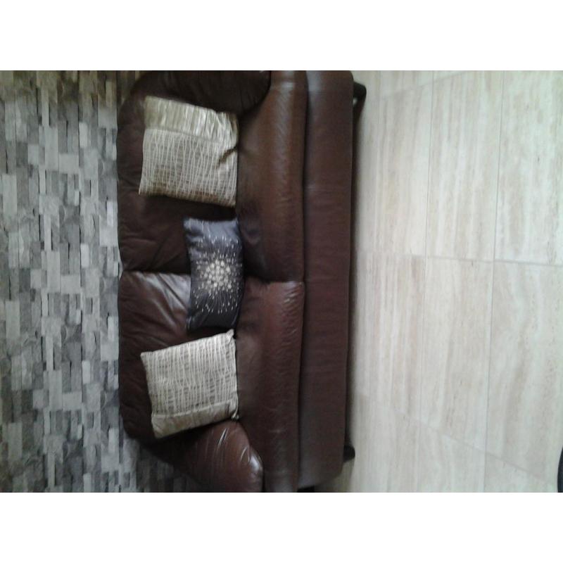 Three seater brown leather sofa for sale