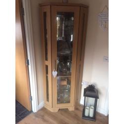 Corner glass display cabinet