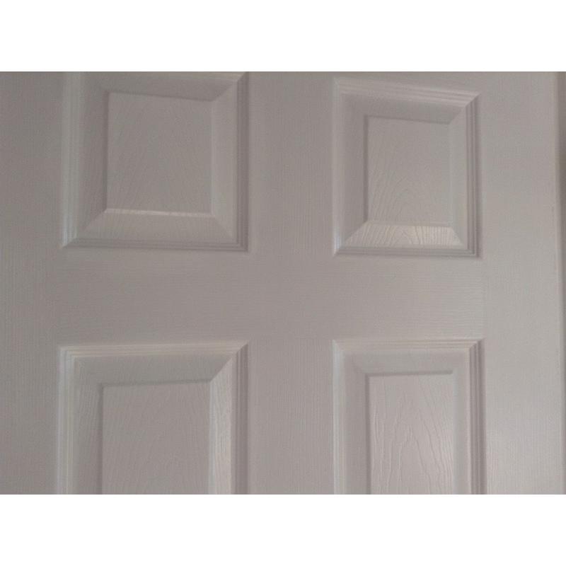 4 x Internal White panelled wood grain effect doors