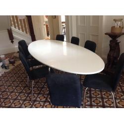 Large oval white hi gloss table and chairs for sale