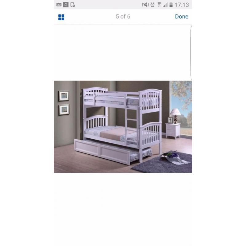 White solid wood bunk bed with trundle...brand new in boxes...mattress not included