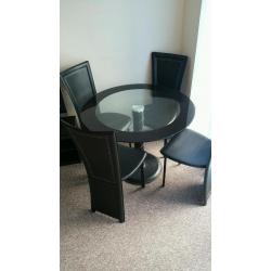 Glass top table and 4 chairs