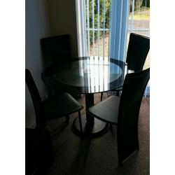 Glass top table and 4 chairs