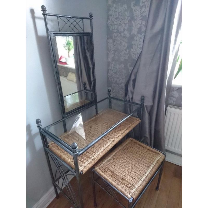 Wrought iron and wicker dressing table.