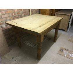 Solid wood farmhouse dining table