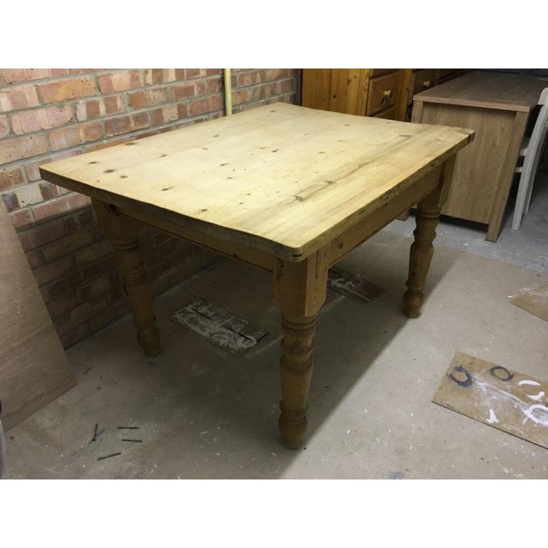 Solid wood farmhouse dining table