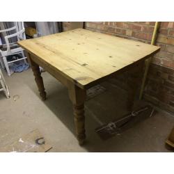 Solid wood farmhouse dining table