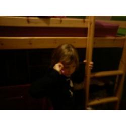 mid sleeper bed with chest of drawers, desk and storage unit.