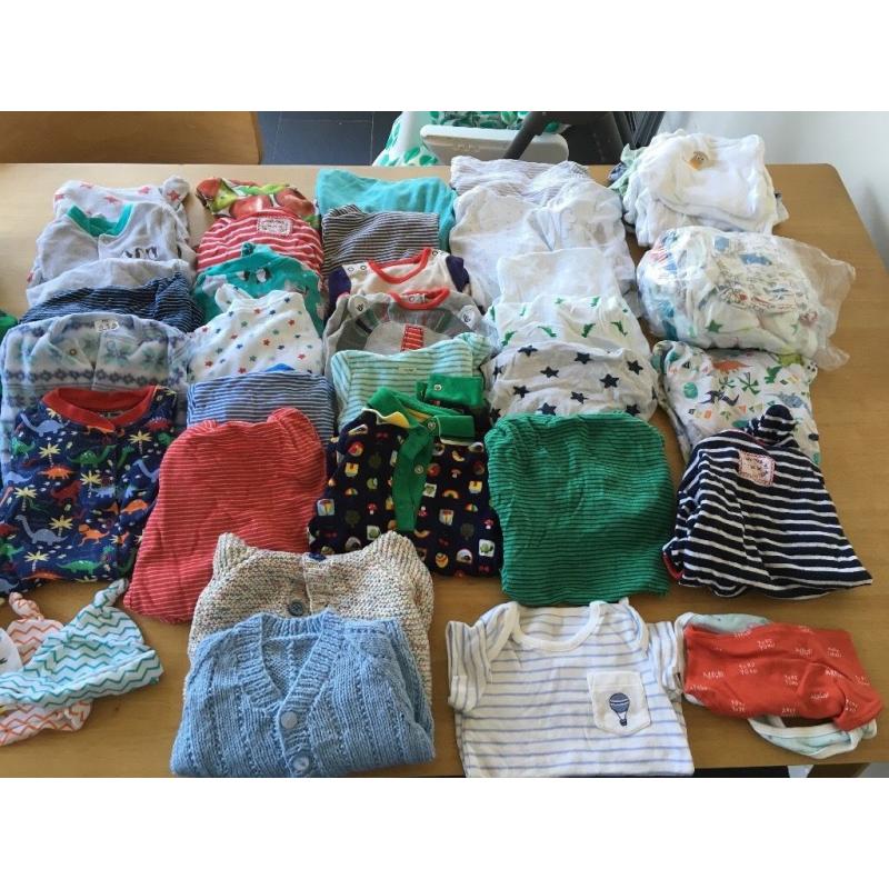 Bundle of newborn baby clothes