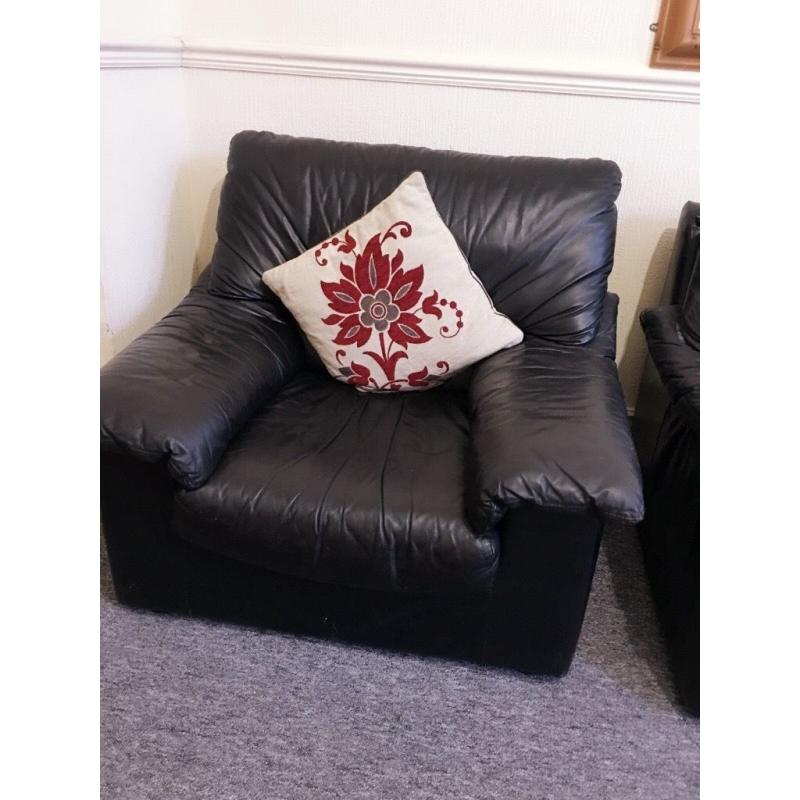 3+2 seater leather sofa and two beautiful reddish and cream febric armchairs