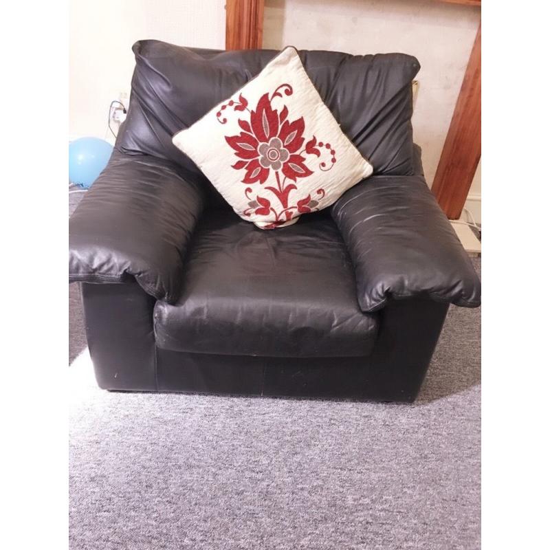 3+2 seater leather sofa and two beautiful reddish and cream febric armchairs