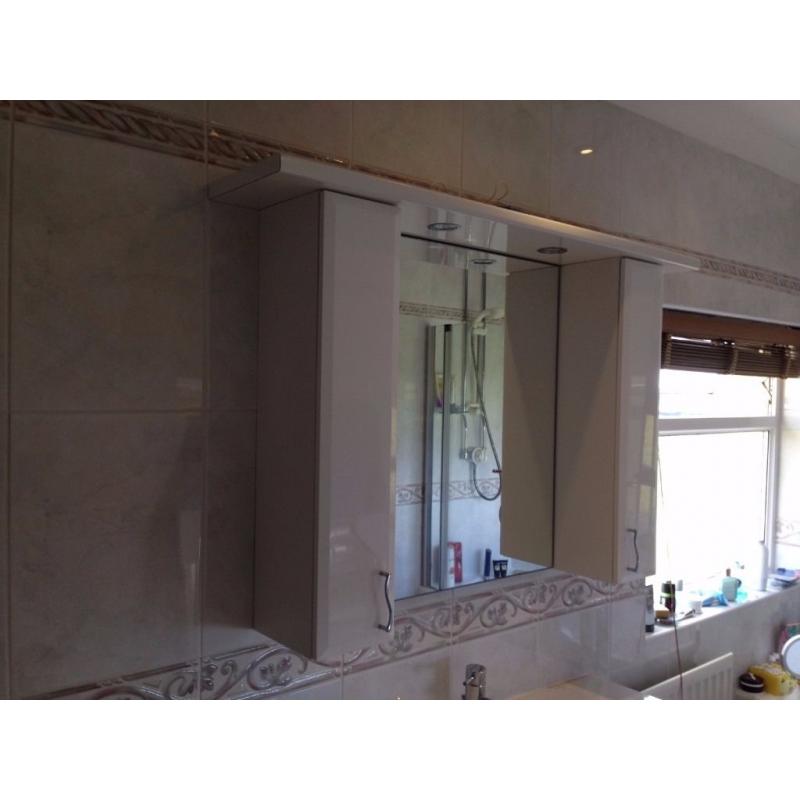 Bathroom wall cabinets and mirror plus lighting plinth in good condition