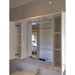 Bathroom wall cabinets and mirror plus lighting plinth in good condition