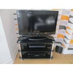 BLACK GLOSSY GLASS TV STAND WITH CHROME LEGS - 32" (POSS 34") GC