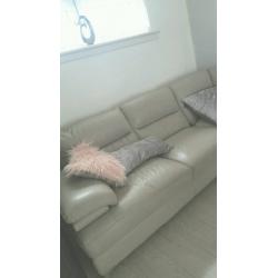 Grey leather corner sofa and chair