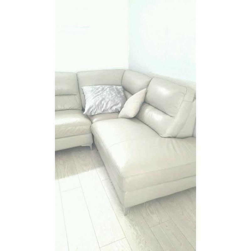 Grey leather corner sofa and chair