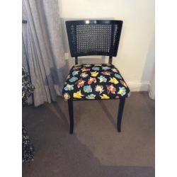 upcycled black painted chair upholstered in pokeman material