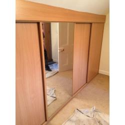 Sliding wardrobe doors and tracks